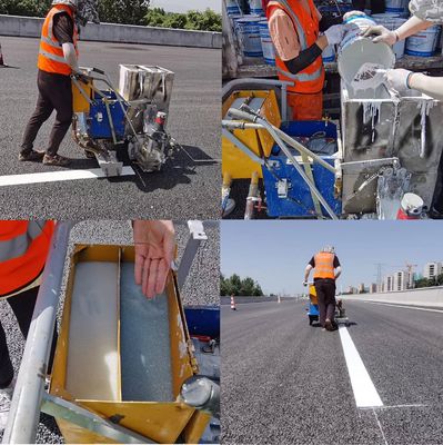 Macchine per la marcatura delle linee stradali a due componenti